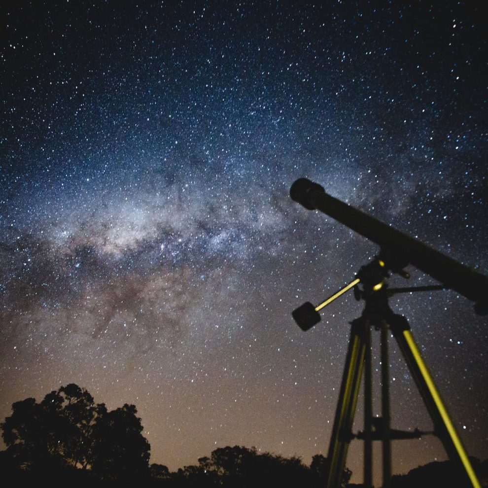 black telescope under blue and blacksky